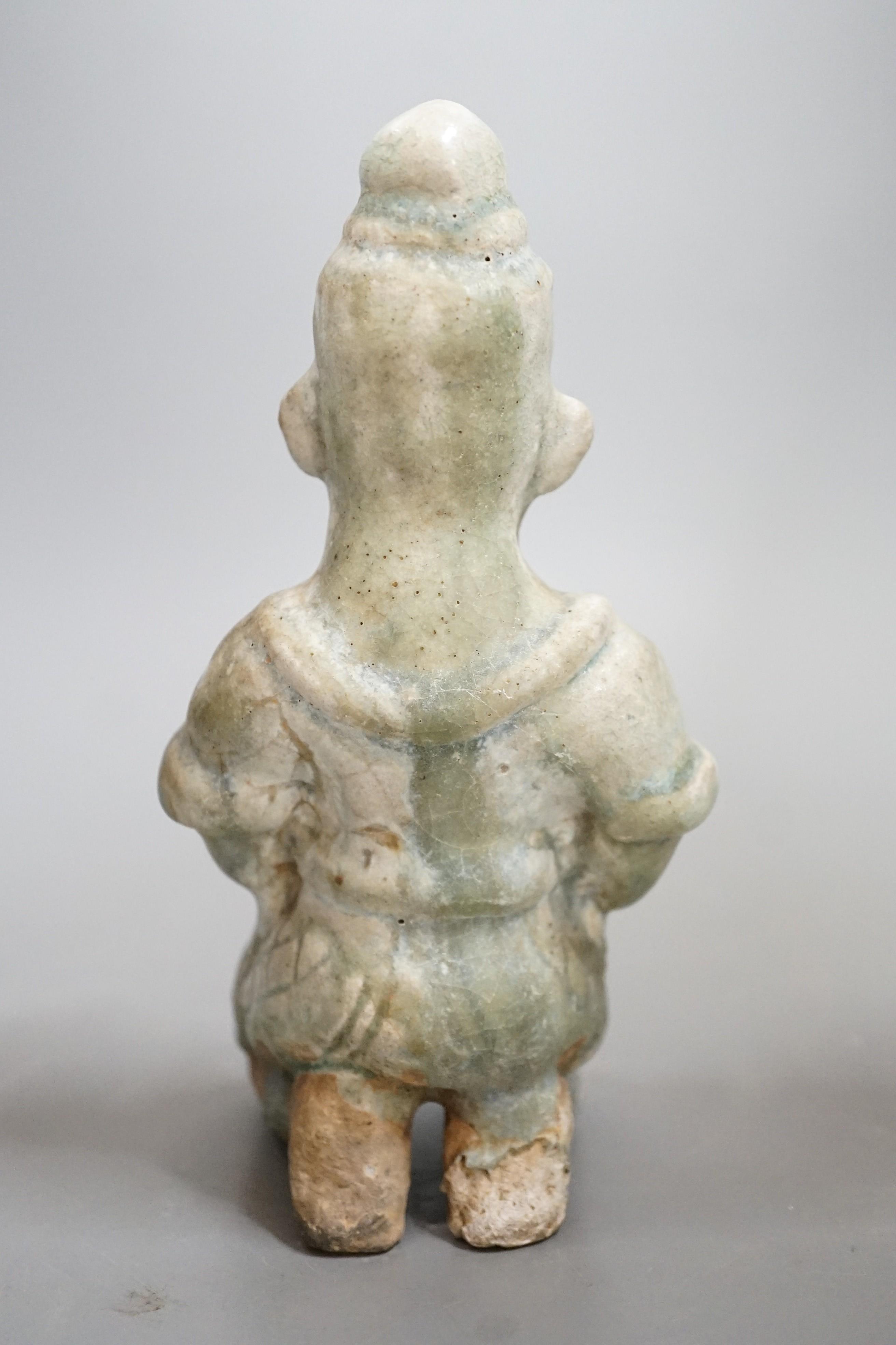 A Thai celadon Buddhist figure, Si Satchanalai, c.1450-1599, 18cms high